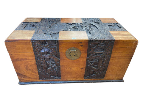 Oriental carved camphorwood trunk, 49cm by 103cm by 52cm.