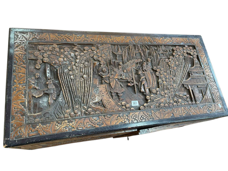 Oriental carved camphorwood low two door cabinet, 51cm by 97cm by 47cm.