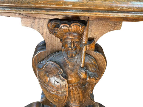 Rectangular oak coffee table raised on carved figural Knight supports joined by stretcher, 57cm by 116cm by 60cm. thumbnail
