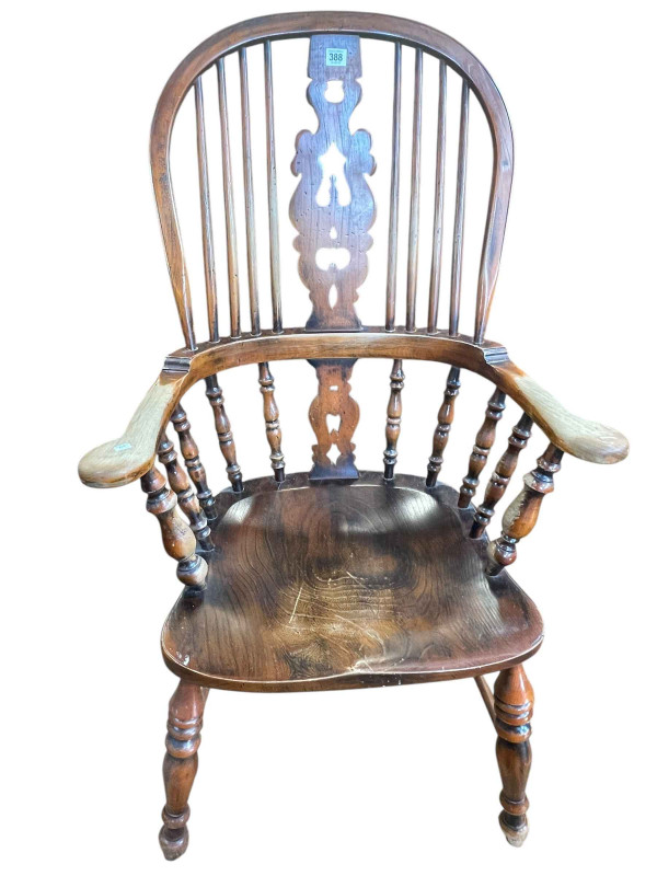 Windsor pierced splat back elbow chair.