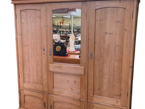 Continental pine arched top wardrobe having three doors, one with mirror...