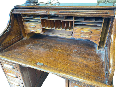 Early 20th Century oak seven drawer roll top pedestal desk, 125cm by 127cm by 80cm. thumbnail