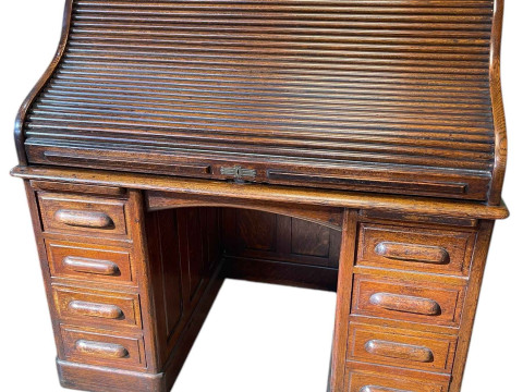 Early 20th Century oak seven drawer roll top pedestal desk, 125cm by 127cm...