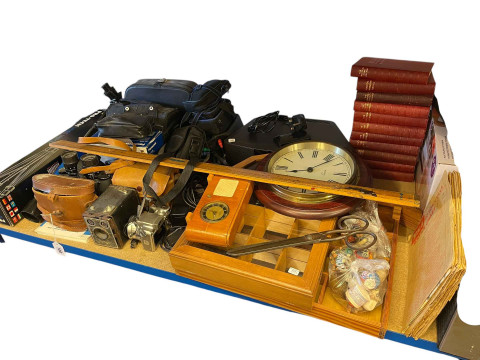Collection of cameras, books, radio, clock, tripod, etc.