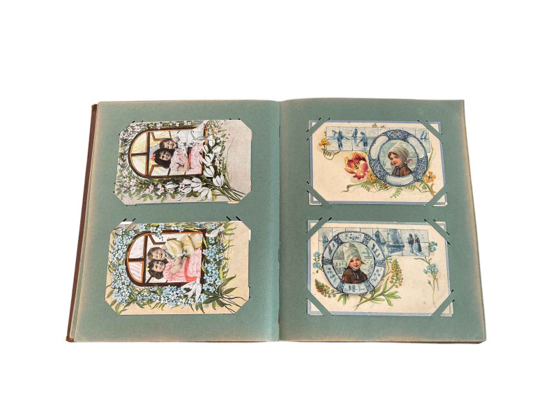 Postcard album housing topographical Britain, greetings, etc.