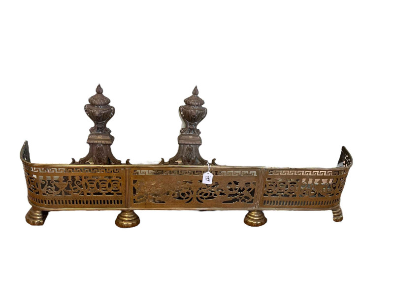Victorian pierced brass fender, pair of large brass fire dogs and set of three fire irons.