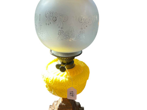 Victorian cast base oil lamp with yellow glass reservoir and frosted and...