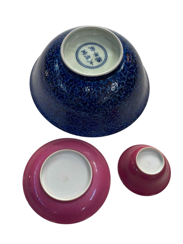 Chinese tea bowl and saucer, well painted with butterflies and flower, along with a Chinese blue outer glazed bowl, six character mark, 20.5cm diameter.