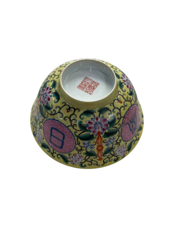 Chinese pottery bowl with floral design on yellow ground with jiaqing seal mark to base, 15.5cm.
