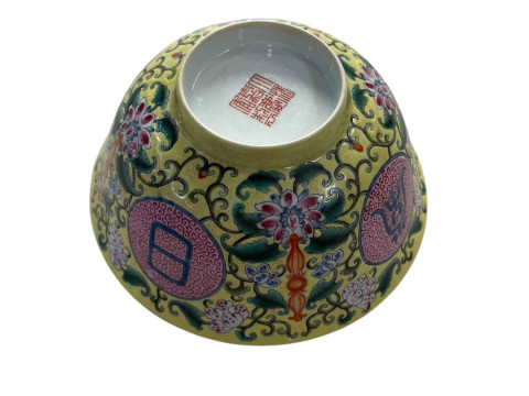 Chinese pottery bowl with floral design on yellow ground with jiaqing...