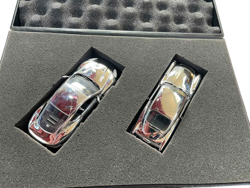 Corgi silvered Aston Martin DB5 and DBS for James Bond 007 re-packaged in 007 case.