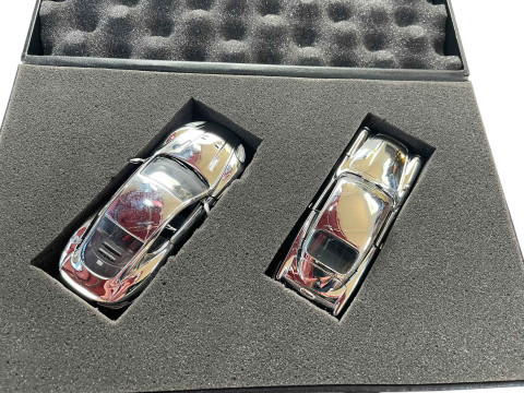 Corgi silvered Aston Martin DB5 and DBS for James Bond 007 re-packaged...