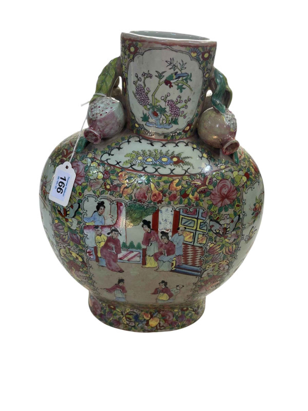 Large Cantonese 19th Century flask shaped vase decorated with figures in panels surrounded by flowers and butterflies, the short cylindrical neck flanked with pomegranates, 40.5cm.