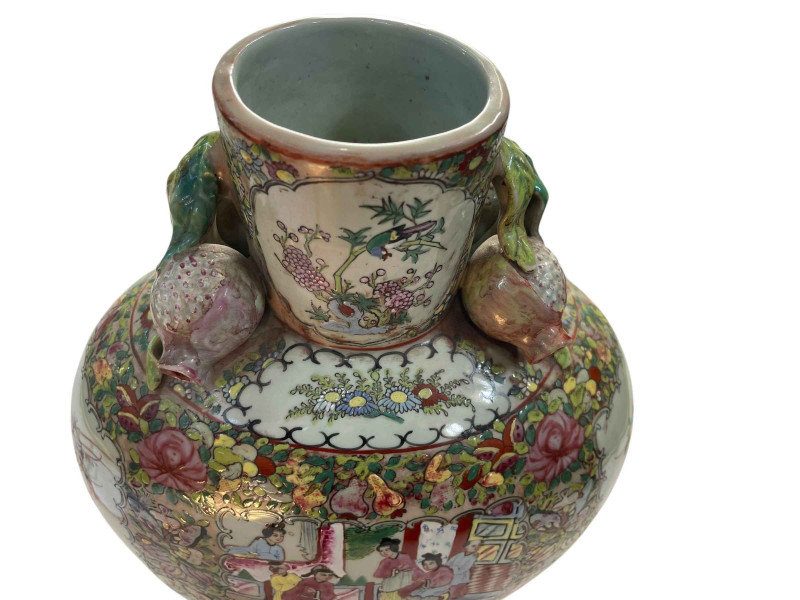 Large Cantonese 19th Century flask shaped vase decorated with figures in panels surrounded by flowers and butterflies, the short cylindrical neck flanked with pomegranates, 40.5cm.
