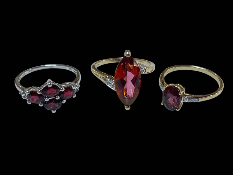 Three 9 carat gold, gem set and diamond rings.