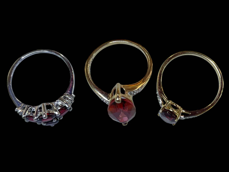 Three 9 carat gold, gem set and diamond rings.