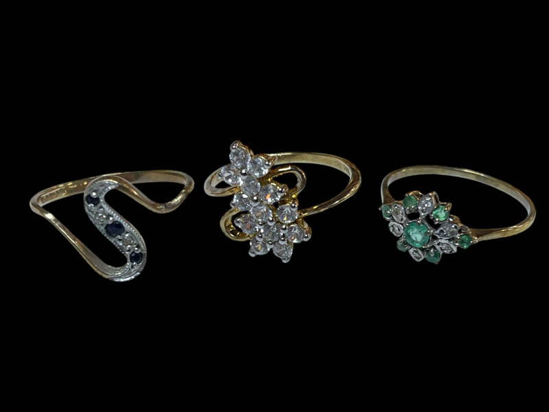 Sapphire and diamond 9 carat gold ring and two 9 carat gold gem set rings.