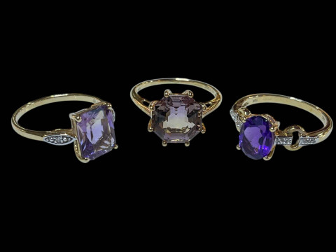 Amethyst and diamond 9 carat gold ring, and two dress rings.