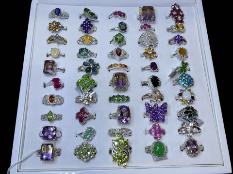 Cased collection of silver and gem set dress rings (50).