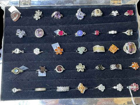 Cased collection of silver and gem set dress rings (35).