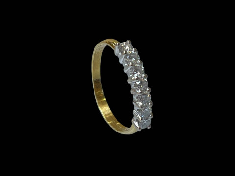 18 carat yellow gold and diamond seven stone ring, size N. thumbnail