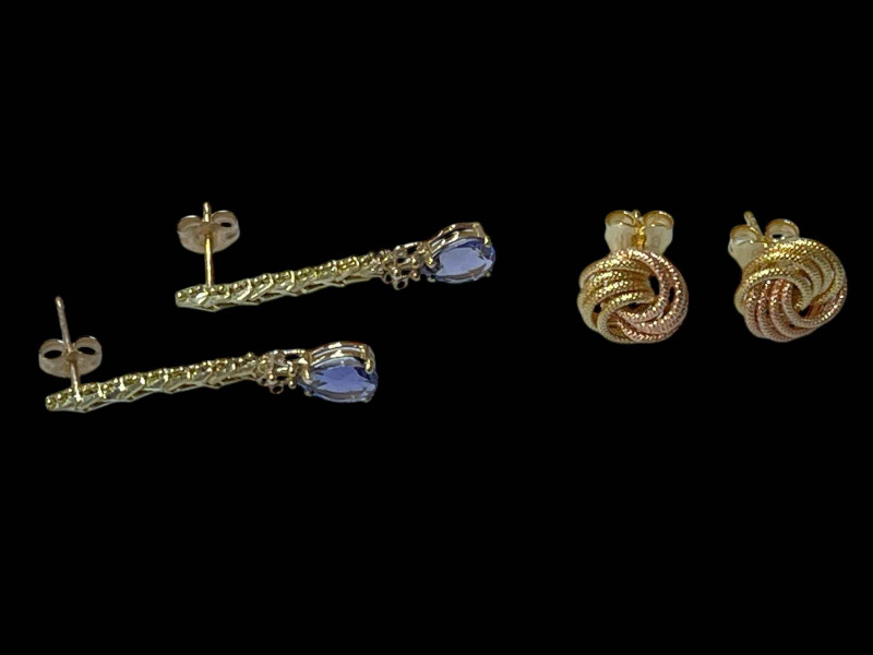 Pair of 10k tanzanite drop earrings and pair of two colour 18 carat gold rope twist design earrings.