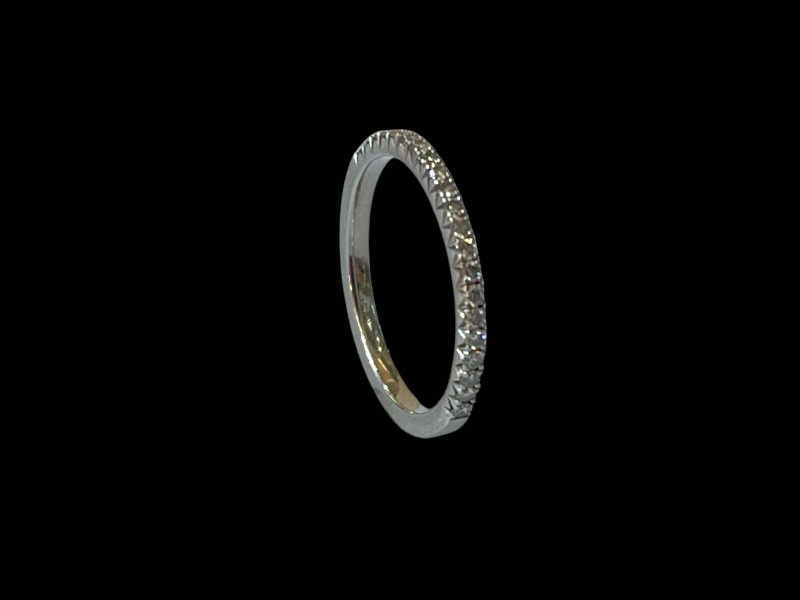 Rox platinum and diamond half eternity ring, size J.