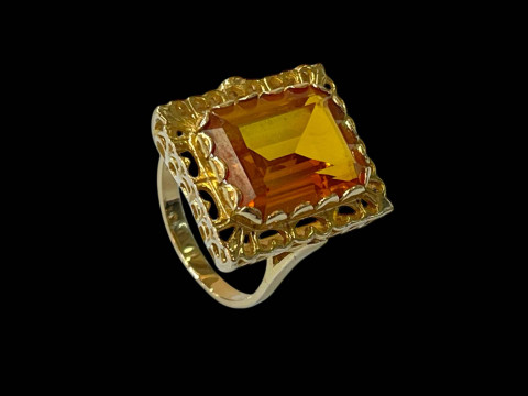 Large orange sapphire (probably lab created) and 9 carat yellow gold ring, size Q. thumbnail
