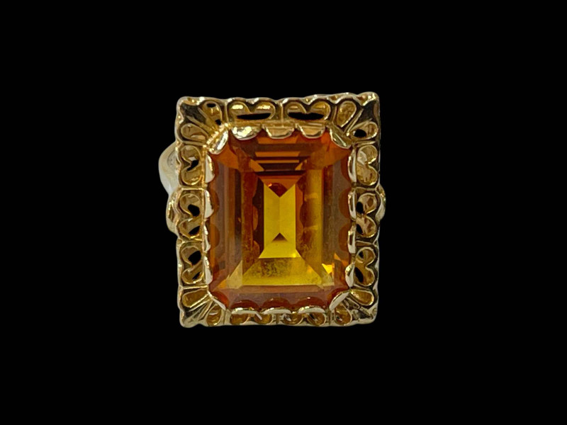 Large orange sapphire (probably lab created) and 9 carat yellow gold ring, size Q.