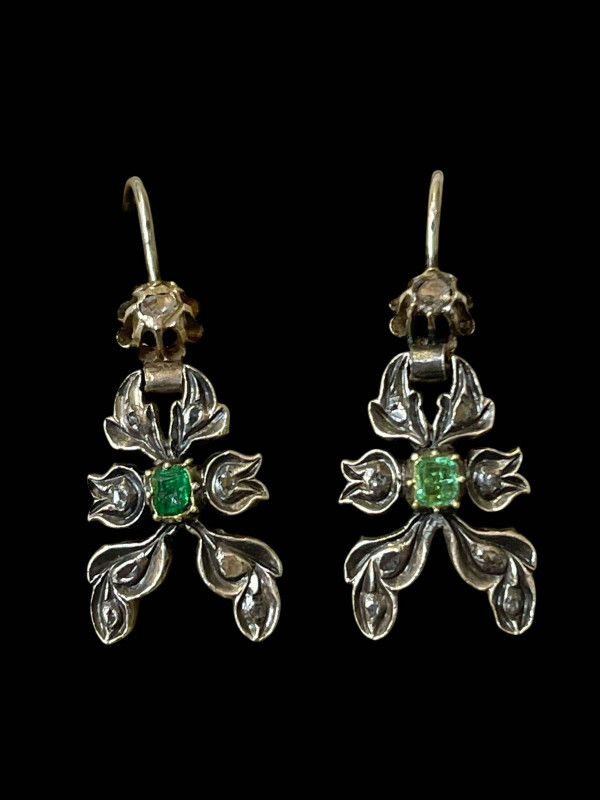 Pair of emerald and diamond drop earrings set in yellow gold and silver.