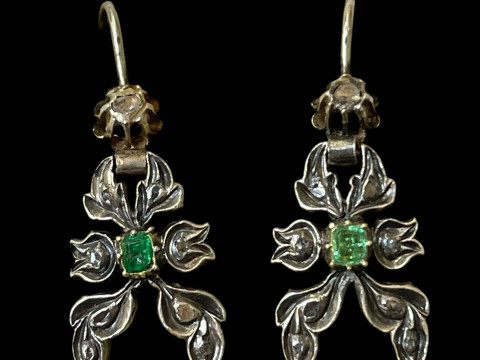 Pair of emerald and diamond drop earrings set in yellow gold and silver.