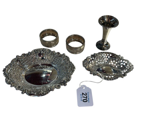 Two pierced silver dishes, small spill vase and two napkin rings.