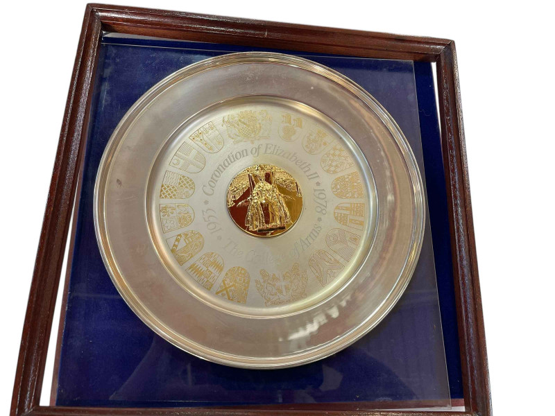 Two silver commemorative plates for the Coronation of QEII 1953-1978 with gilt image of the Coronation surrounded by Coats of Arms with names for each to the reverse, marks for the Yorkshire Mint.