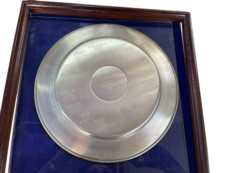 Two silver commemorative plates for the Coronation of QEII 1953-1978 with gilt image of the Coronation surrounded by Coats of Arms with names for each to the reverse, marks for the Yorkshire Mint.