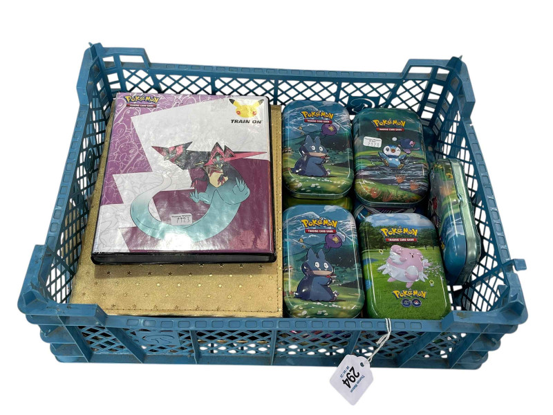 Collection of Pokemon including cards, holograms, albums and card cases.