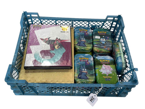 Collection of Pokemon including cards, holograms, albums and card cases.