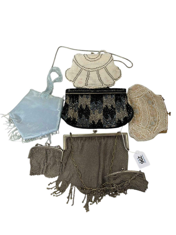 Collection of seven evening purses and collection of hat pins.