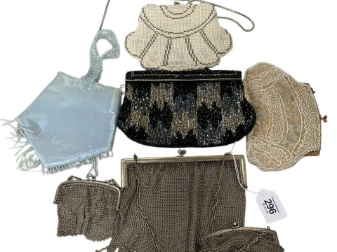 Collection of seven evening purses and collection of hat pins.