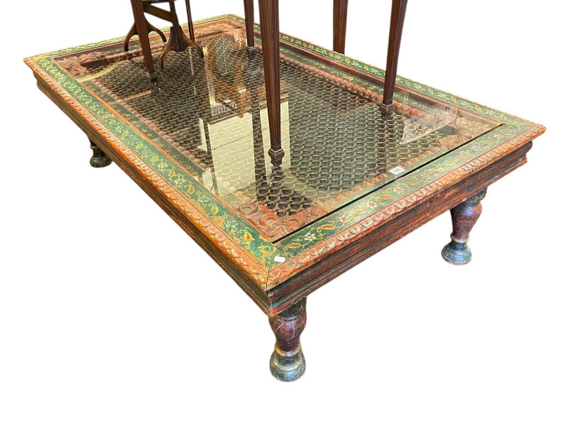 Large painted Indian rectangular low centre table with inset glass top, 46cm by 153cm by 91cm.