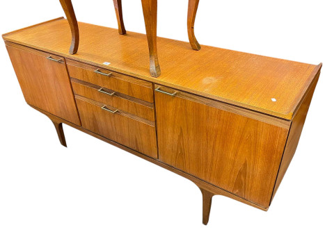Mid Century teak sideboard and extending dining table with integral leaf. thumbnail