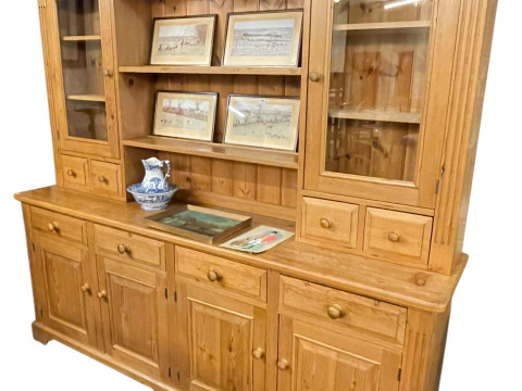 Large pine dresser, the upper section with two central shelves flanked...