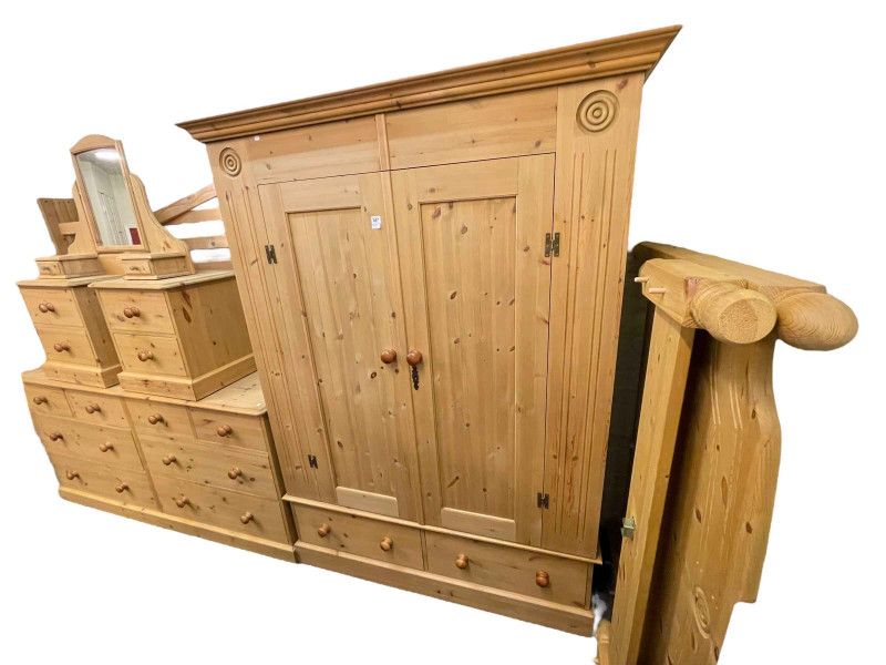 Six piece pine bedroom suite comprising two door wardrobe with two base drawers, 199cm by 146cm by 56cm, chest of four short above four long drawers, 89cm by 185cm by 43.5cm, pair two drawer pedestals, dressing mirror and double bedstead.