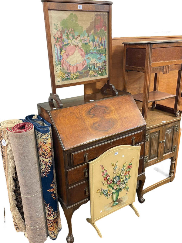 Walnut three drawer bureau, oak sewing trolley, Old Charm two door pedestal cabinet, two firescreens and three rugs (8).