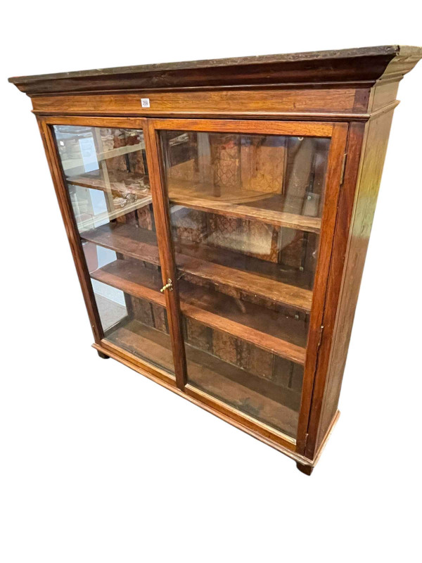 Early 20th Century glazed two door cabinet, 135cm by 131cm by 33cm.