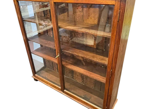 Early 20th Century glazed two door cabinet, 135cm by 131cm by 33cm.