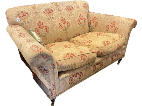 Contemporary two seater settee with feather cushions.