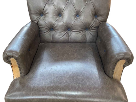 Andrew Martin designer button backed leather armchair.