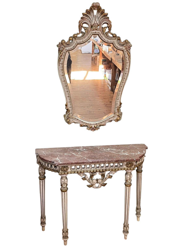 Continental marble topped bow end console table and bevelled wall mirror, table 72cm by 90.5cm by 32cm, mirror 95cm by 56cm.