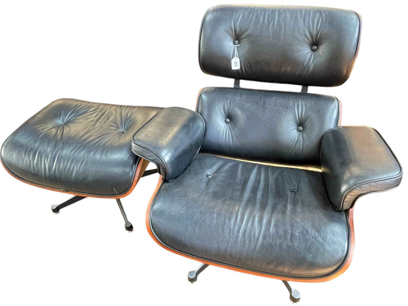 Charles Eames replica black buttoned leather and rosewood lounge chair and footstool.