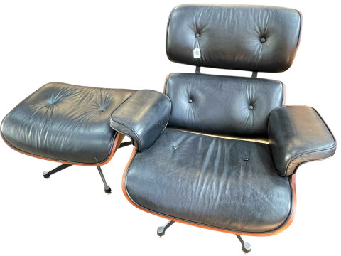 Charles Eames replica black buttoned leather and rosewood lounge chair...